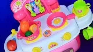 Cooking with toy kitchen and velcro cutting fruits and vegetables