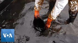 Locals Attempt to Contain Oil Spill Threatening Mauritius