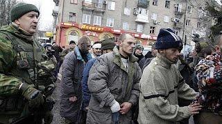 Captured Ukraine soldiers face angry crowd at scene of bus shelling, Donetsk