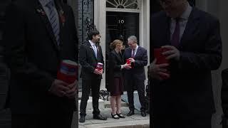 Prime Minister Keir Starmer buys a Poppy outside 10 Downing Street