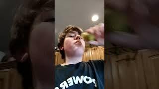 Taking A Shot Of Pickle Juice Out Of A Pickle