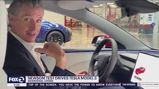 California Gov. Newsom tests out a Tesla in Shanghai