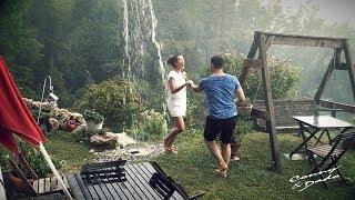 Conny & Dado dancing Salsa in the summer rain