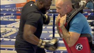 OUCH!  iFLTV'S ANDREW McCART TAKES A SICKENING BODY SHOT FROM BIG HEAVYWEIGHT MARTIN BAKOLE