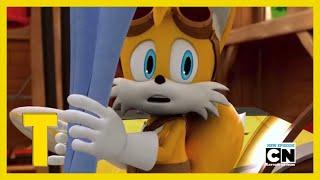 Sonic making a mess of papers in Tails’s workshop | Sonic Boom
