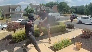 Dueling porch pirates fight to steal package outside home
