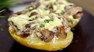 Delicious baked potatoes with mushrooms. A simple and delicious dinner.