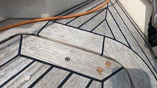 Typical periodic teak deck maintenance on a Hallberg Rassy, replacing bungs.