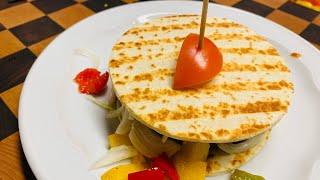 L’autismo in cucina.Matteo e il suo barbecue. Hamburger con piadina peperoni cipolla ￼