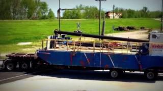 Shallow Draft Elevating Boats on a Flat bed truck - www.ShallowDraft.com - (504) 682-2100