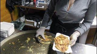 France Street Food. Preparing Socca, Pancake of Chickpea Flour. Seen in Nice