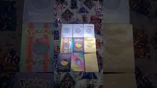 Pokémon card golden silver black and colourful