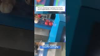 Pillow packing machine for fruits and vegetables of different sizes