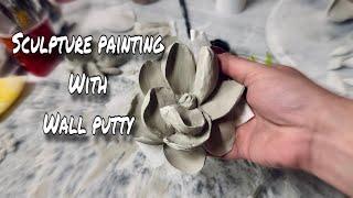 Sculpture painting flower with wall putty.