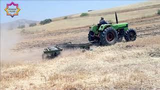 farm equipment at work - Machine Tractor in Action