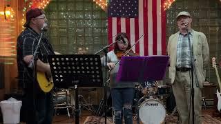 Amazing Grace preformed by Tim & Jewel McClain, along with Christopher Lawrie.