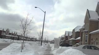 Everyday Life in Canada :Archway in the front lawn and speed monitor