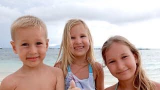 Children playing on the beach 4K