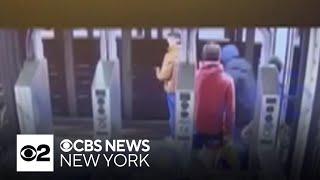 Person of interest in custody after NYC subway shove attack, police sources say