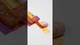 Piggy eats a pack of spicy strips