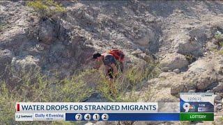 Volunteers leave bottled water for migrants in deadly smuggling corridor