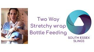 Bottle feeding in a two way stretchy or close caboo