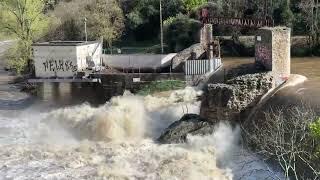 Water pouring over Dam while on Tournon, France Steam Train