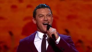 Luke Evans singing “Oh, What a Beautiful Mornin’”