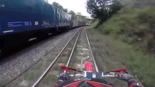 Dirt bike almost hit by train!!