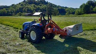 mowing, raking and baling small square bales