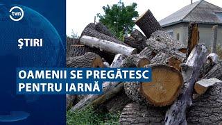 OAMENII SE PREGĂTESC PENTRU IARNĂ