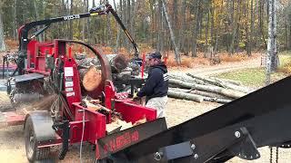 Used 18-24 wood processor, log loader trailer, and 1/3 cord firewood bags
