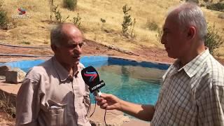 Assyria TV in Tur Abdin: Petros Karatay is building the new Herbole village in Mount Qardu Cudi