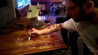 Artist Phil Morgan Freesketching on a Pub Table