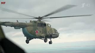 A TV report on a helicopter unit searching for and destroying semi-submersible marine drones.