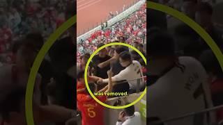 Fan gets kicked out for wearing a Tottenham shirt at the China v South Korea game