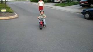 Lars riding bike at 2 years 6 months.