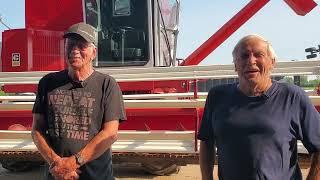 Vintage Roto Thresh Combine hits the field to harvest wheat in Saskatchewan