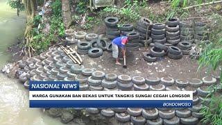 WARGA GUNAKAN BAN BEKAS UNTUK TANGKIS SUNGAI CEGAH LONGSOR