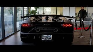 A new ecstatic Aventador SVJ customer taking delivery of his car at Lamborghini Walnut Creek.