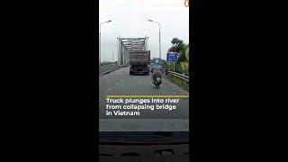 Truck plunges into river from collapsing bridge in Vietnam | AJ #shorts