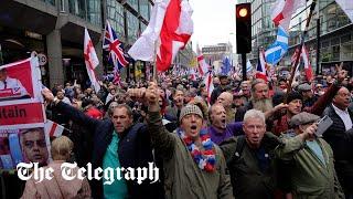 Thousands of Tommy Robinson supporters march through London