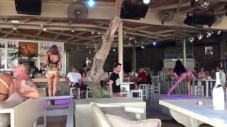 Beautiful girls thong dance in Superparadise beach Mykonos