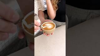 Teaching a beginner how to pour latte art