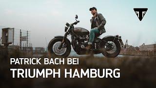 Patrick Bach bei Triumph Hamburg (... und fährt die Bobber Black)