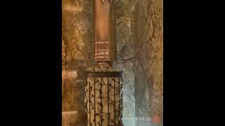 Русская баня с мраморной облицовкой зоны за печью