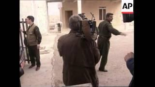 Weapons inspectors visit military facility