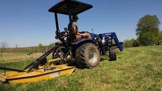 Electric Farm Tractor testing....first time brush mowing tall grass