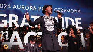 Aloe Blacc Performs “SHINE” at the 2024 Aurora Prize Ceremony