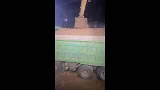 Shantui excavator performance: Loading Dirt
